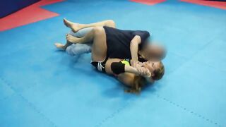 Strong nice fitness girl vs man headscissor wrestling
