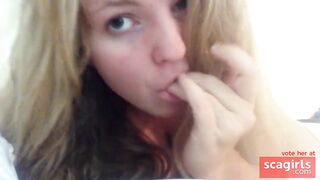 Busty blonde plays with herself