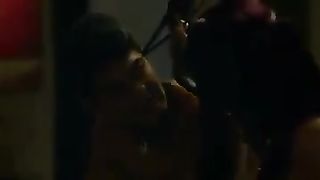 White dominatrix dominating Indian man on bed