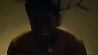 White dominatrix dominating Indian man on bed