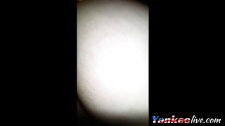 Mandi taking the bottle