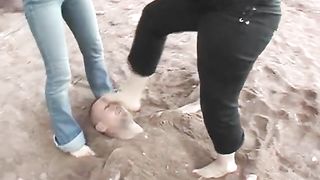 Beach buried foot licking