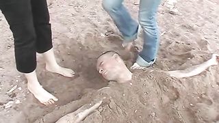 Beach buried foot licking