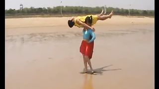 Asian Supergirl lift and carry