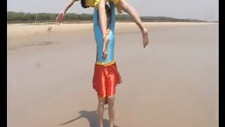 Asian Supergirl lift and carry