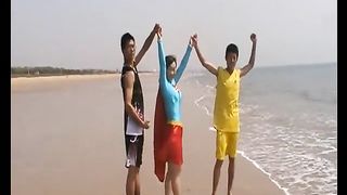 Asian Supergirl lift and carry