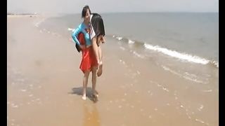 Asian Supergirl lift and carry