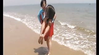 Asian Supergirl lift and carry