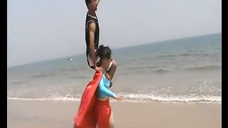 Asian Supergirl lift and carry