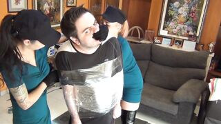 The girls bust in and bind him