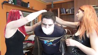 Three ladies forcibly hogtie male