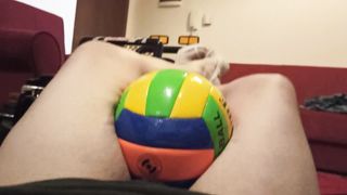 Crush volleyball between her things easily