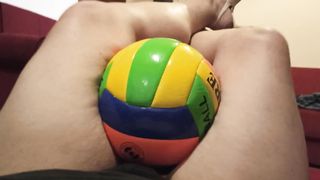 Crush volleyball between her things easily